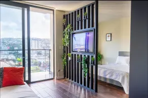 Stylish Downtown Retreat City Views+Prime Location - Image 2