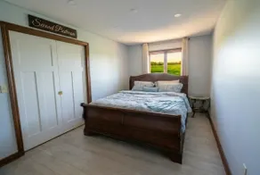Calm river home, where quiet dreams flow. - Image 4