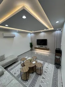 Private suite with bedroom and living room - Image 2