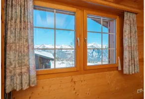 Charming Alpine Chalet with Mountain Views - Image 5
