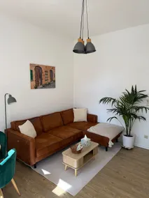 Well-maintained apartment with garden - Image 3