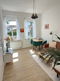 Well-maintained apartment with garden - Image 2