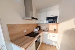 Bright Apartment with Continuous Balcony and Sea View - Image 3