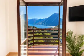 The Terrace Overlooking Lake Como - Image 3