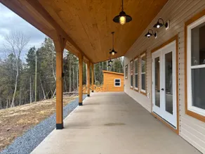 Modern cabin with guest house - Image 2