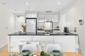 Serene Coastal Apartment with Free Parking Pool Gym - Image 5