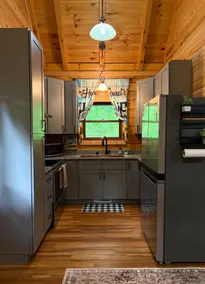 Cozy Dunlap cabin getaway with creek and playset - Image 5