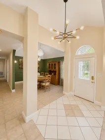 Green Door Getaway | Charming White Brick Retreat - Image 3