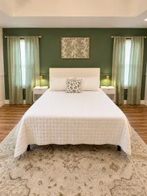 Green Door Getaway | Charming White Brick Retreat - Image 4