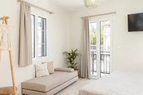 Sunny Boutique Home with Balcony - Image 5