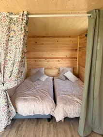 Cabin surrounded by farm animals - Image 2