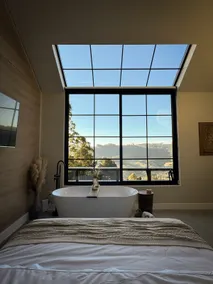 Cabin with earthen walls and a view of the valley - Image 2