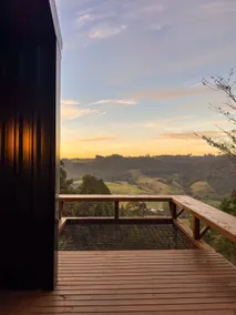 Cabin with earthen walls and a view of the valley - Image 5