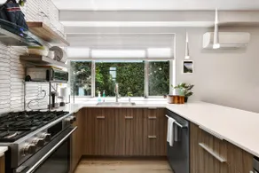 Bright & Cozy Seward Park 1BR w/Rooftop Patio + AC - Image 2