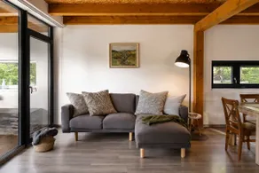Modern cottage with large covered terrace by pond - Image 5