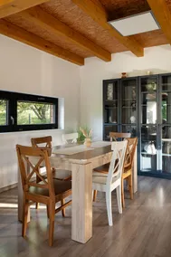 Modern cottage with large covered terrace by pond - Image 4
