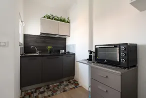 Luxury Design Suite with Balcony and Wi-Fi - Image 4