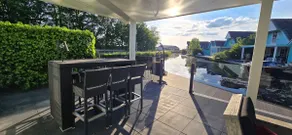 Vacation villa with hot tub, private dock, and veranda - Image 5
