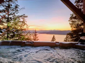 Waterfront Escape with Hot Tub & Epic Sunset Views - Image 4