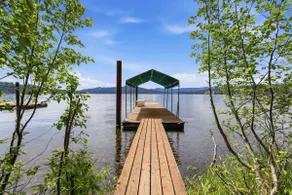 Waterfront Escape with Hot Tub & Epic Sunset Views - Image 3