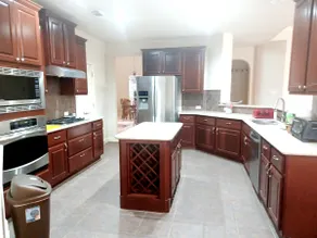 Spacious Home with Multiple Living Areas - Image 3