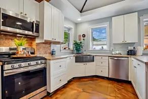 Bluff Street Gem | 3BR w/Exposed Brick & Charm - Image 4
