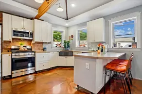 Bluff Street Gem | 3BR w/Exposed Brick & Charm - Image 3
