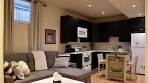 Private 2BR Suite | Kitchen & Laundry - Image 5