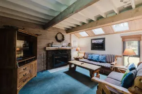 Wood-beam cabin with amazing location pools hot tub & SHARC passes - Image 2