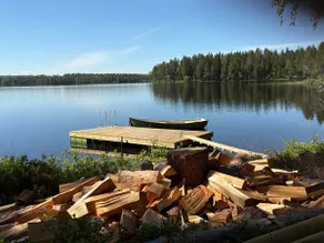 Secluded lake house with a private jetty and a boat - Image 2
