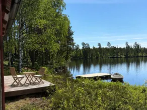 Secluded lake house with a private jetty and a boat - Image 5