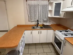 Apartment with covered garage and full kitchen. - Image 5