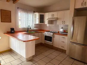 Apartment with covered garage and full kitchen. - Image 2