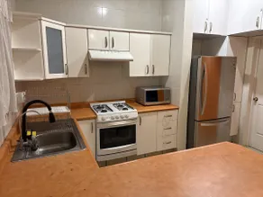 Apartment with covered garage and full kitchen. - Image 4
