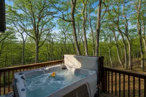 Cozy Cabin w Hot Tub Fire Pit & Loft Getaway - Image 2