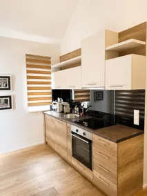 Apartment with a patio - Image 5