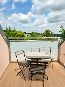 Apartment with a patio - Image 3