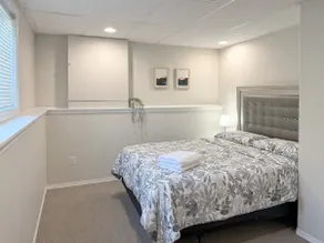 Bright & Spacious 2BR Suite | Private Entrance - Image 2