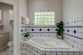 3BR water-view home with fireplace, deck, tub, W/D - Image 3