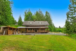 Unique mountain view log home with a wood stove, balcony, patio, & board games - Image 2