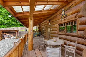 Unique mountain view log home with a wood stove, balcony, patio, & board games - Image 4