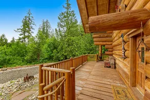 Unique mountain view log home with a wood stove, balcony, patio, & board games - Image 3