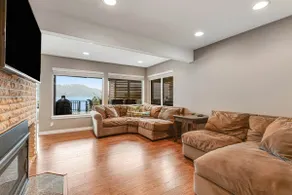 2BR lakefront home - kayaks, grill, beach access - Image 2