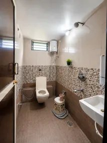 Navyas suites 1 bedroom, 1 living room, 1 kitchen - Image 3