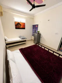 Navyas suites 1 bedroom, 1 living room, 1 kitchen - Image 2