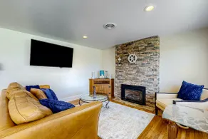 Charming 3BR Home with Cozy Fireplace - Image 2