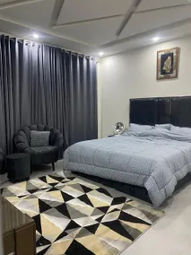 Modern 1BHK Apartment with Kitchen and Dining Area - Image 3
