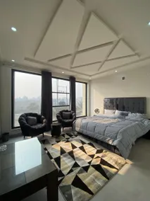Modern 1BHK Apartment with Kitchen and Dining Area - Image 2