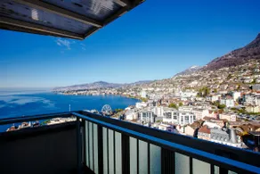 Top-floor 2-bedroom with lake & mountain views - Image 4