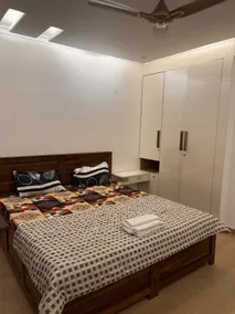 A calm Top-floor 2BHK with a pool-view balcony - Image 4